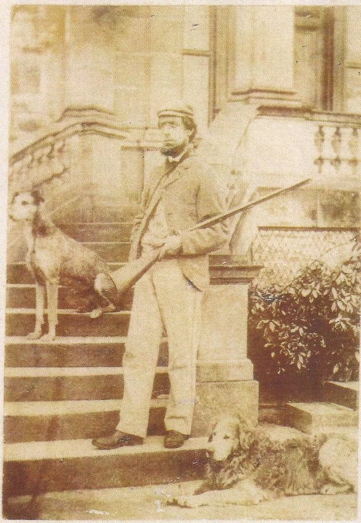 Nous resting beside a gamekeeper at Guisachan in a photograph from the 1870s.
